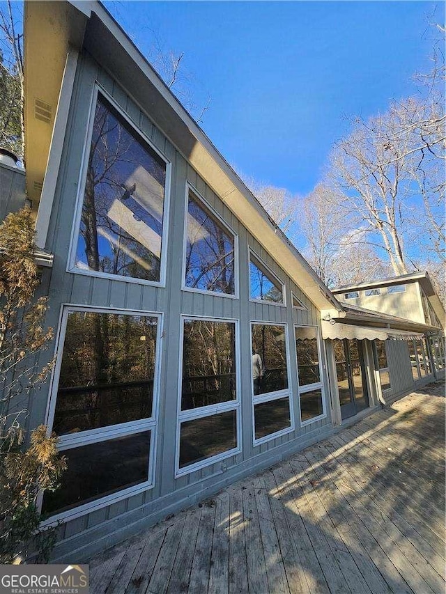 view of home's exterior featuring a deck