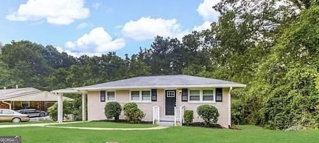 view of front of home with a front yard