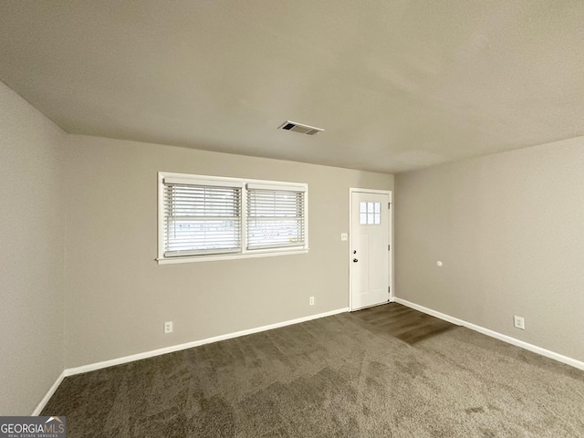 entryway with carpet