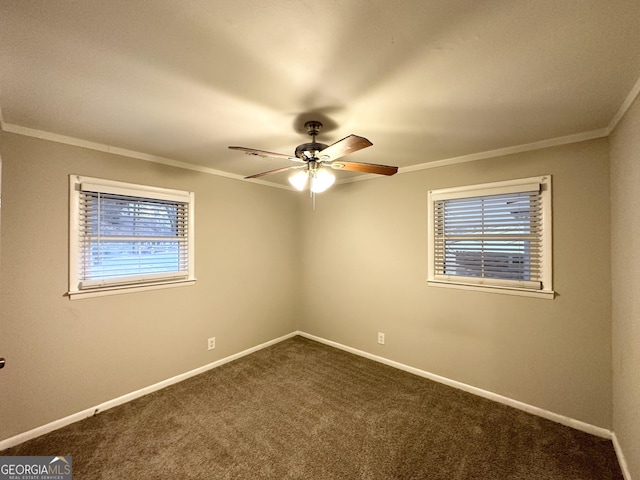 empty room featuring ornamental molding, ceiling fan, and carpet flooring