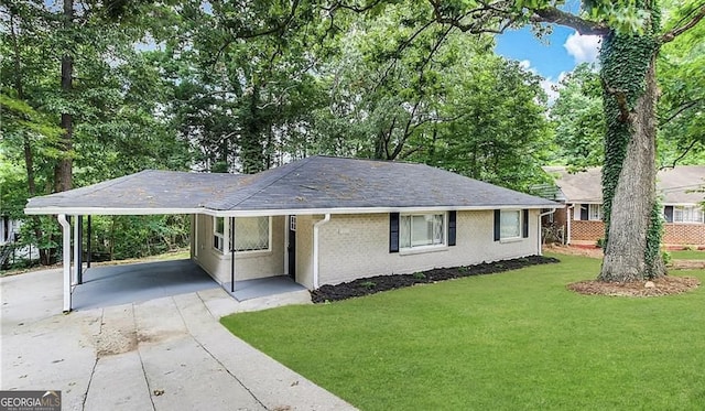 ranch-style house featuring a carport and a front lawn