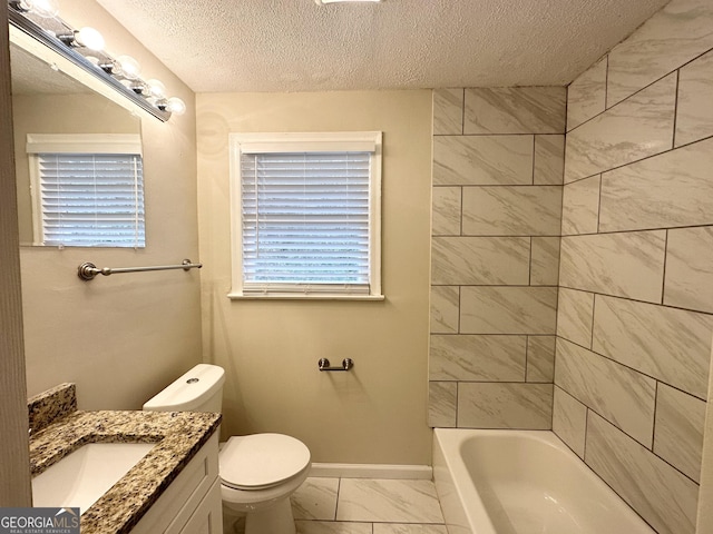1756 Lynn Ln, Decatur, GA 30032 - bathroom with vanity, toilet, and a textured ceiling