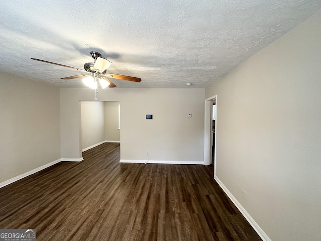 1756 Lynn Ln, Decatur, GA 30032 - unfurnished room with dark wood-type flooring, a ceiling fan, and a textured ceiling