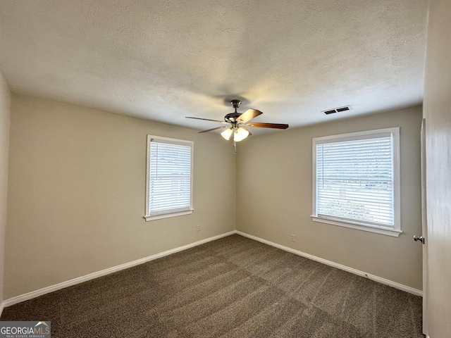 1756 Lynn Ln, Decatur, GA 30032 - carpeted spare room featuring ceiling fan, a wealth of natural light, and a textured ceiling