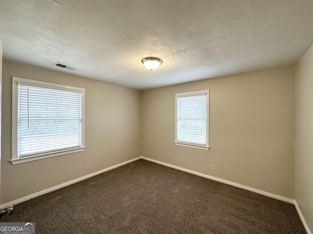 1756 Lynn Ln, Decatur, GA 30032 - unfurnished room featuring carpet and a textured ceiling