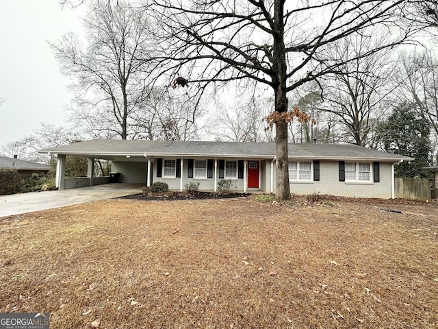 single story home with a carport