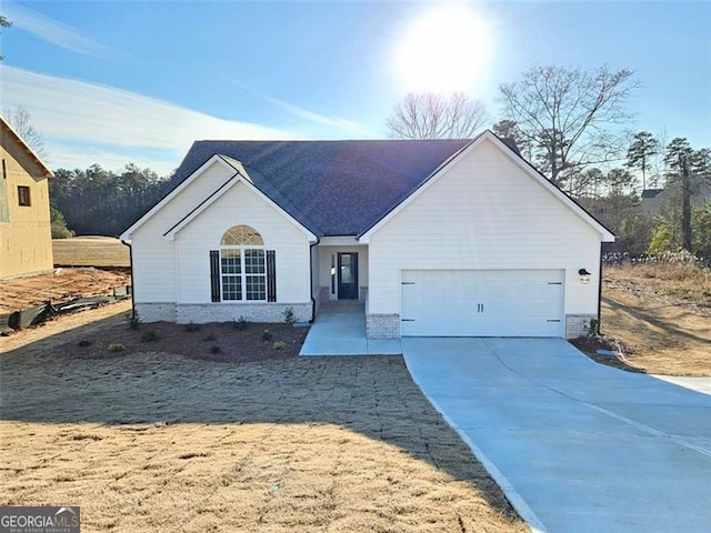 single story home featuring a garage