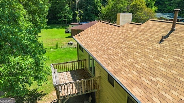 deck featuring a yard