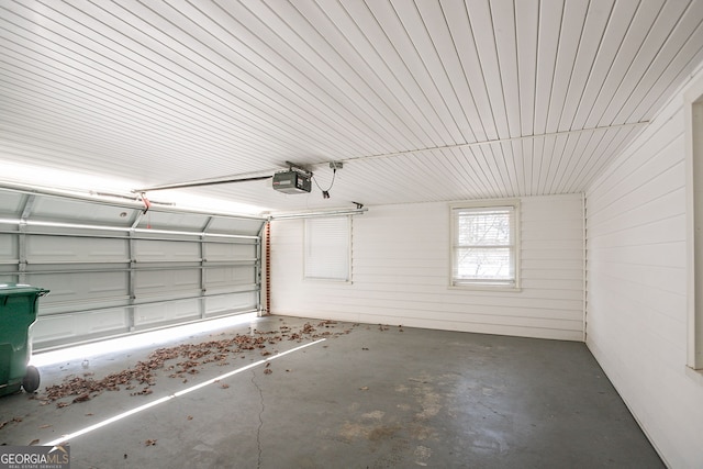 garage featuring a garage door opener