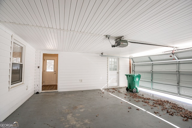 garage featuring a garage door opener