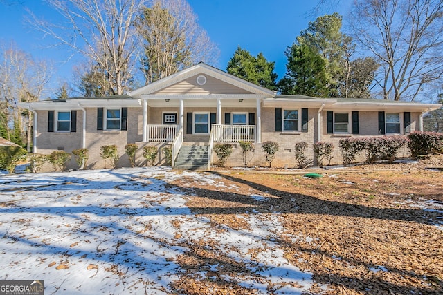 ranch-style home with covered porch