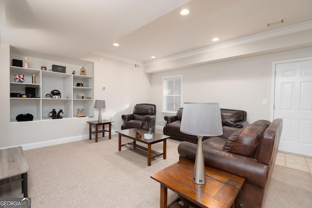 carpeted living room with crown molding