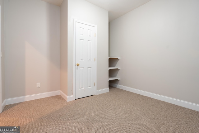 unfurnished bedroom featuring carpet floors