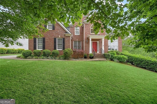 view of front of home with a front yard