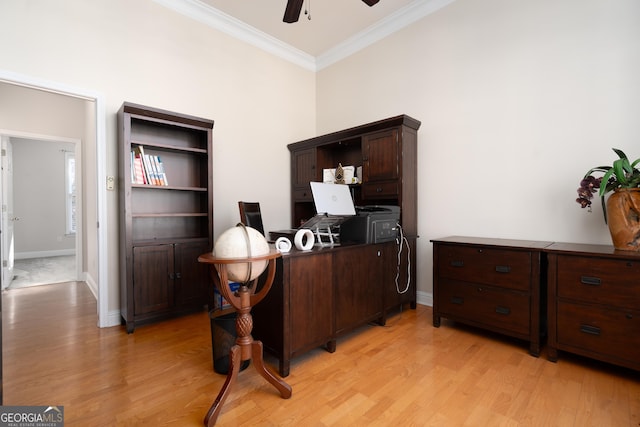 home office featuring ceiling fan, light hardwood / wood-style flooring, and crown molding