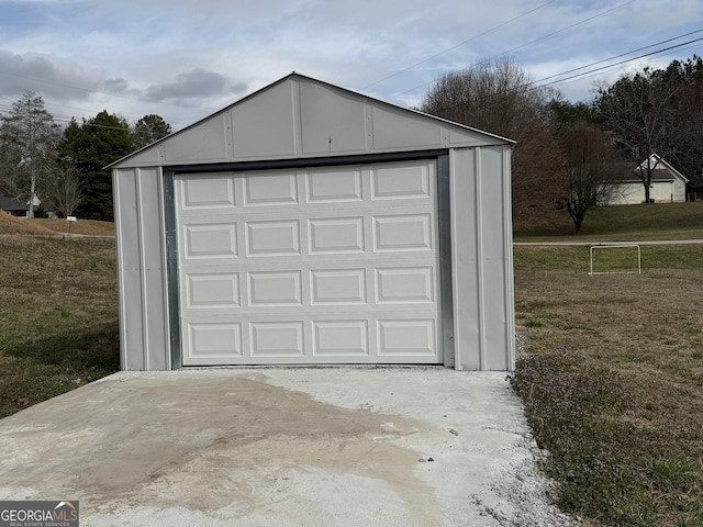 garage featuring a yard