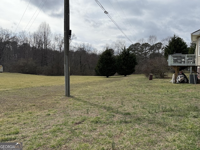 view of yard featuring central AC