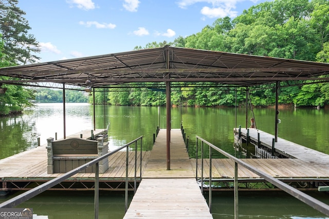 view of dock with a water view