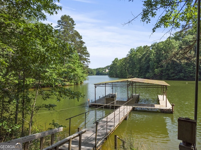 view of dock with a water view