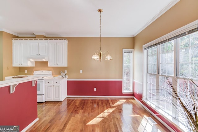 kitchen with white electric range, white cabinetry, hanging light fixtures, light hardwood / wood-style floors, and an inviting chandelier