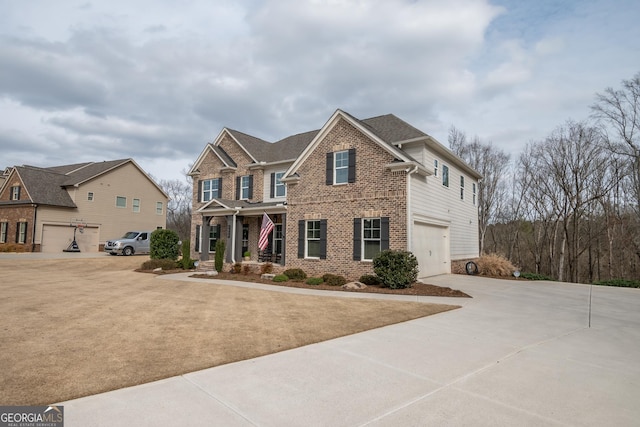 view of front of home featuring a garage and covered porch