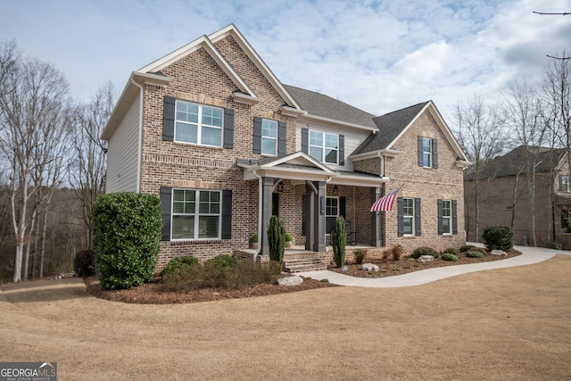 craftsman house with a front lawn