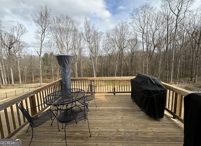 wooden terrace with grilling area