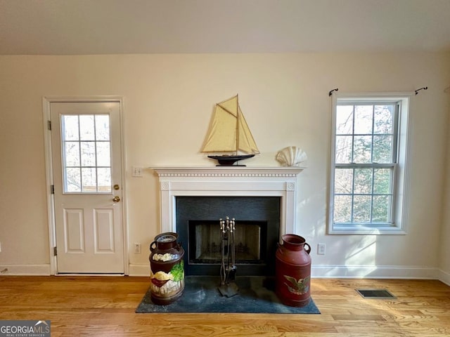 interior details featuring hardwood / wood-style flooring