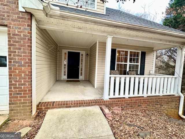 entrance to property with a porch