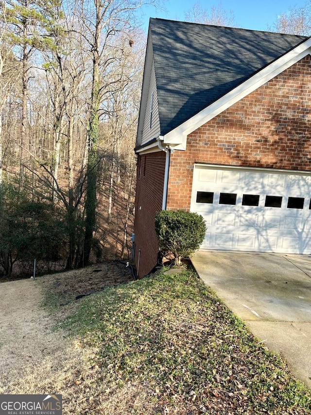 view of home's exterior featuring a garage