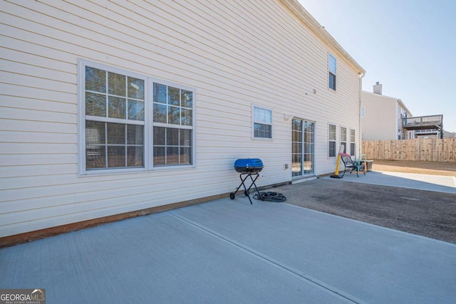 rear view of property featuring a patio