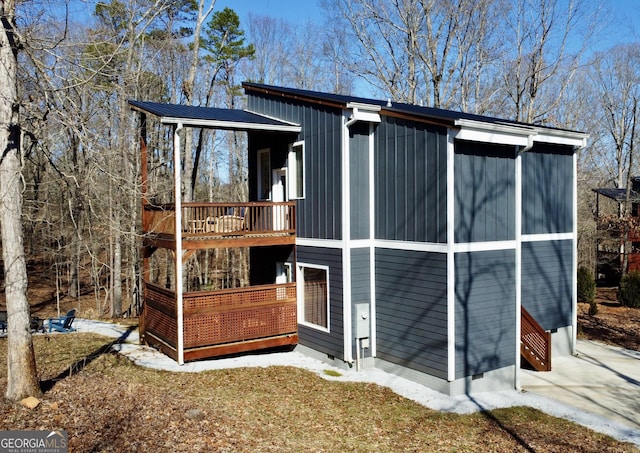 exterior space with crawl space and metal roof