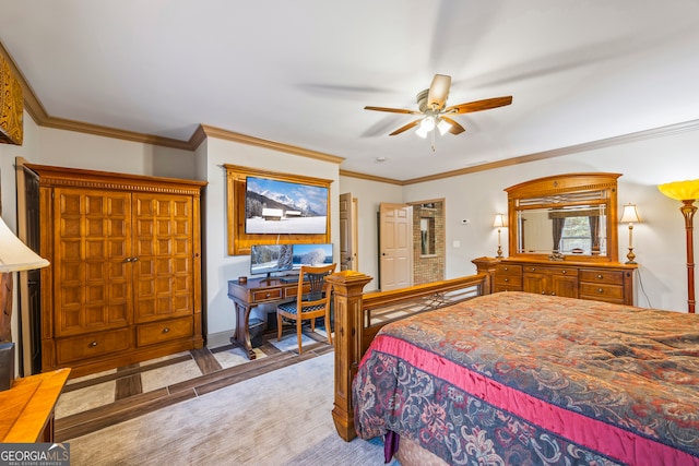 bedroom with ceiling fan, light colored carpet, and ornamental molding