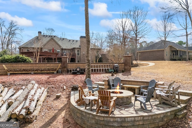 view of patio featuring a fire pit