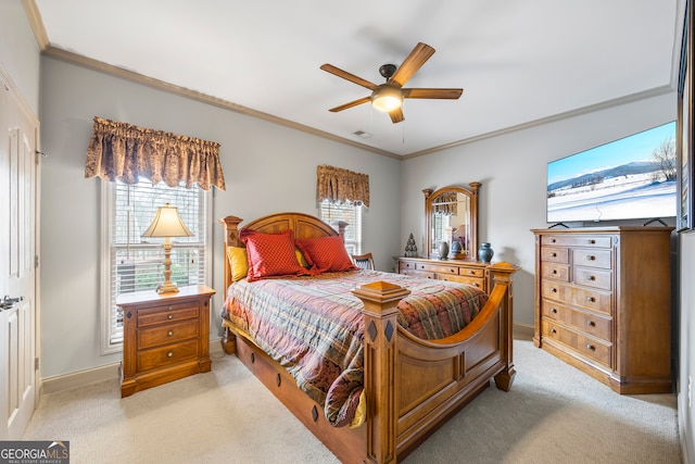 bedroom with light colored carpet, ornamental molding, and multiple windows