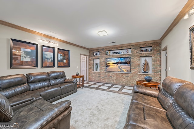 carpeted living room with ornamental molding, visible vents, and brick wall