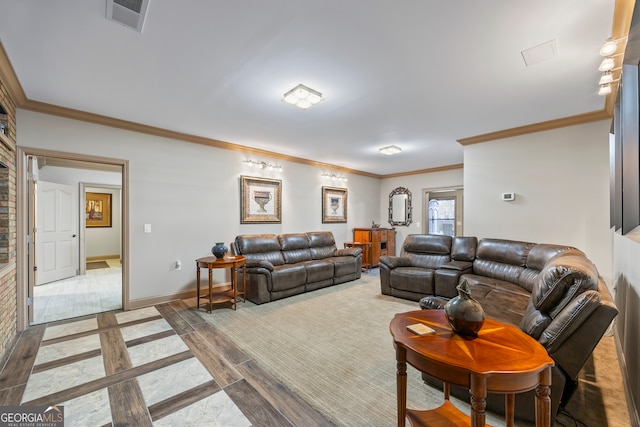 living room featuring ornamental molding and hardwood / wood-style floors