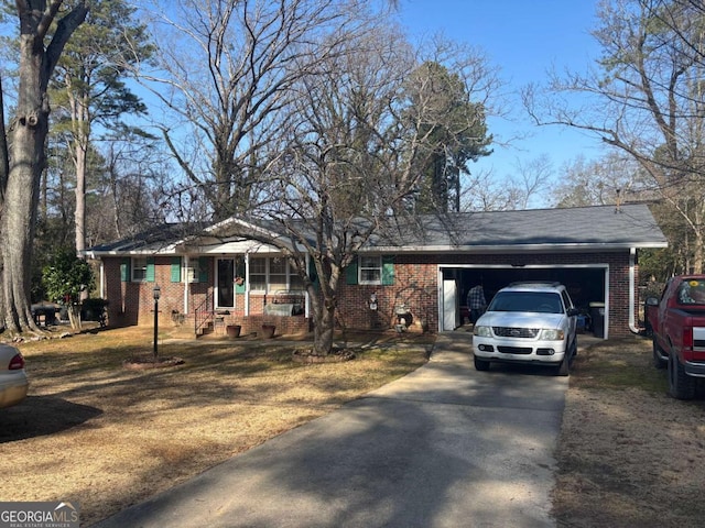 ranch-style house featuring a garage