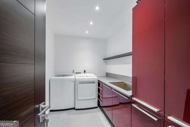 washroom featuring washer and dryer