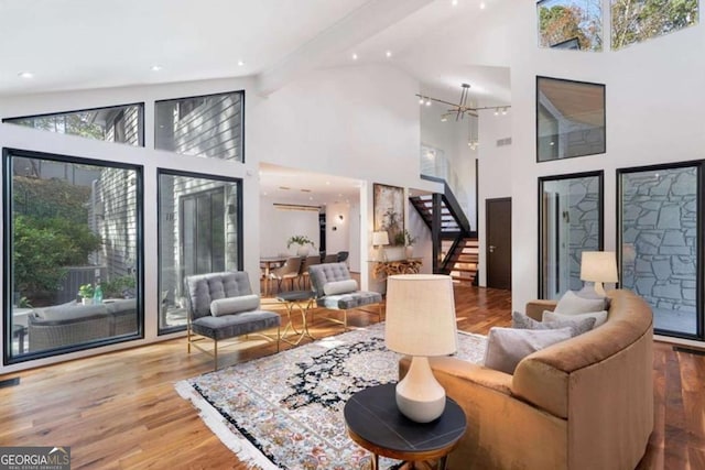 living room with hardwood / wood-style floors and a wealth of natural light