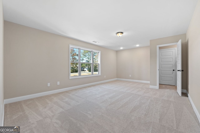 view of carpeted spare room