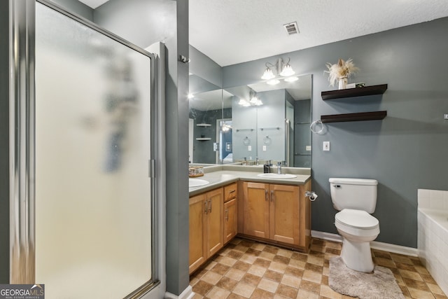 bathroom featuring vanity, plus walk in shower, and a textured ceiling