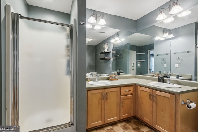 bathroom with vanity and an enclosed shower