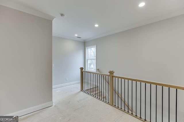 hall featuring baseboards, visible vents, recessed lighting, crown molding, and an upstairs landing