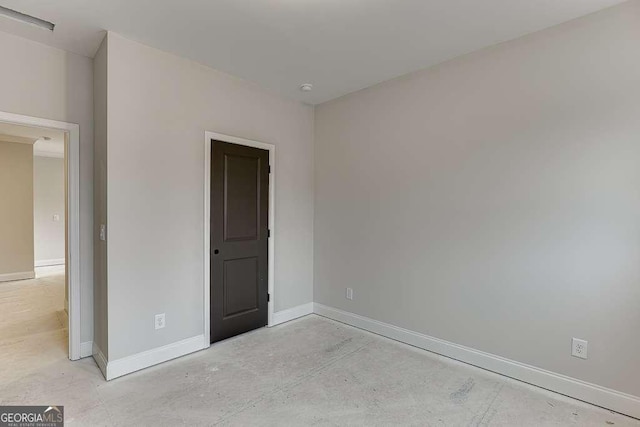 unfurnished bedroom featuring baseboards