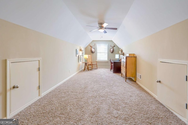 bonus room with light carpet, vaulted ceiling, and ceiling fan