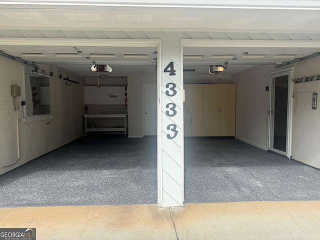 garage featuring a garage door opener