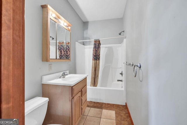 full bathroom with shower / bath combination with curtain, tile patterned floors, vanity, and toilet