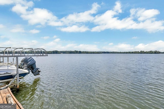 view of water feature with a boat dock