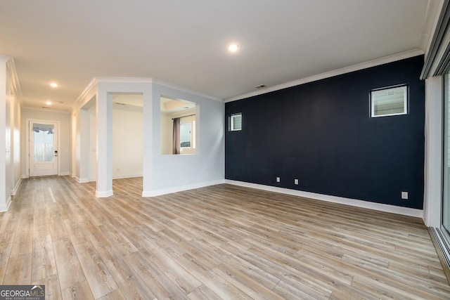 interior space featuring light hardwood / wood-style flooring and ornamental molding